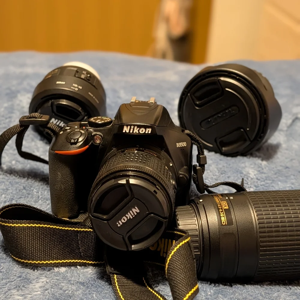 Nikon Black DSLR Camera with 4 Lenses